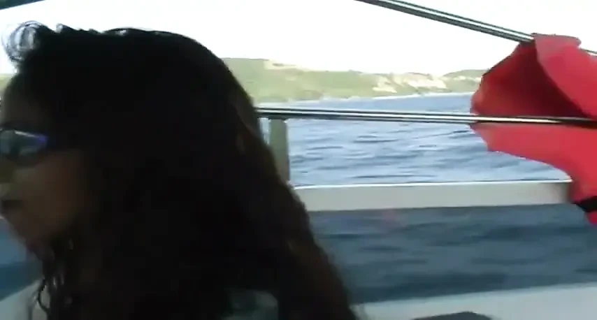 Swimming in the ocean with ebony babe