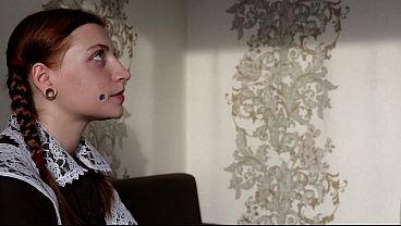 An 18‐year‐old Russian Student Is Doing Her Homework After School